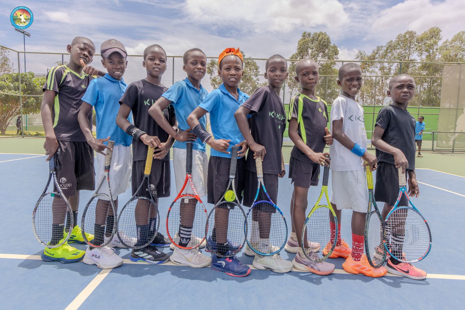 Children in Angola with donated tennis rackets