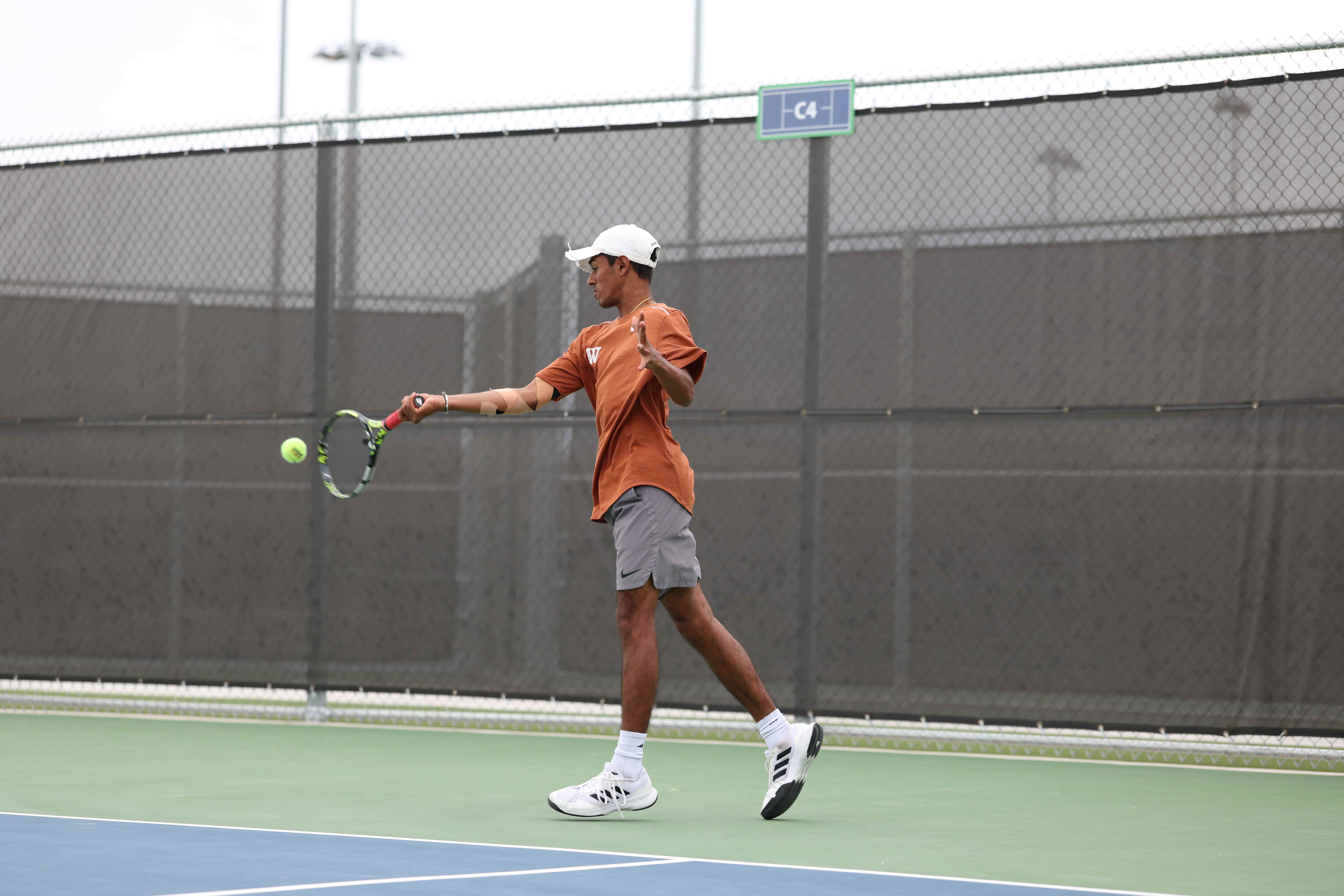 Aayush playing tennis