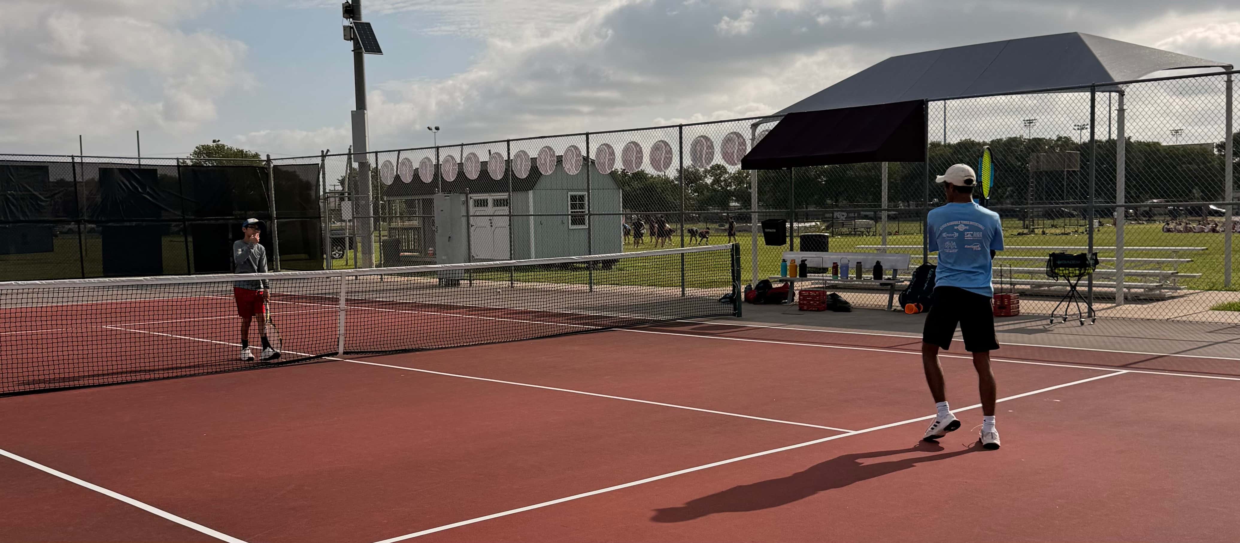Aayush coaching tennis